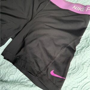 Nike Pro Women's Athletic Shorts in Black and Purple